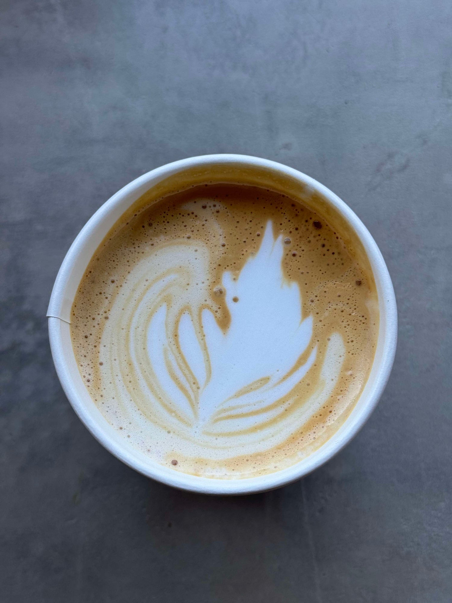a Porch latte using local, hand-roasted, organic coffee